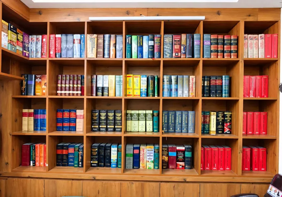 Library wall of law books at the Delhi chambers